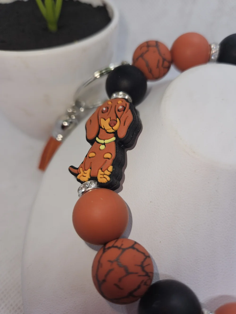 Orange & Black Dog Charm Beaded Wristlet